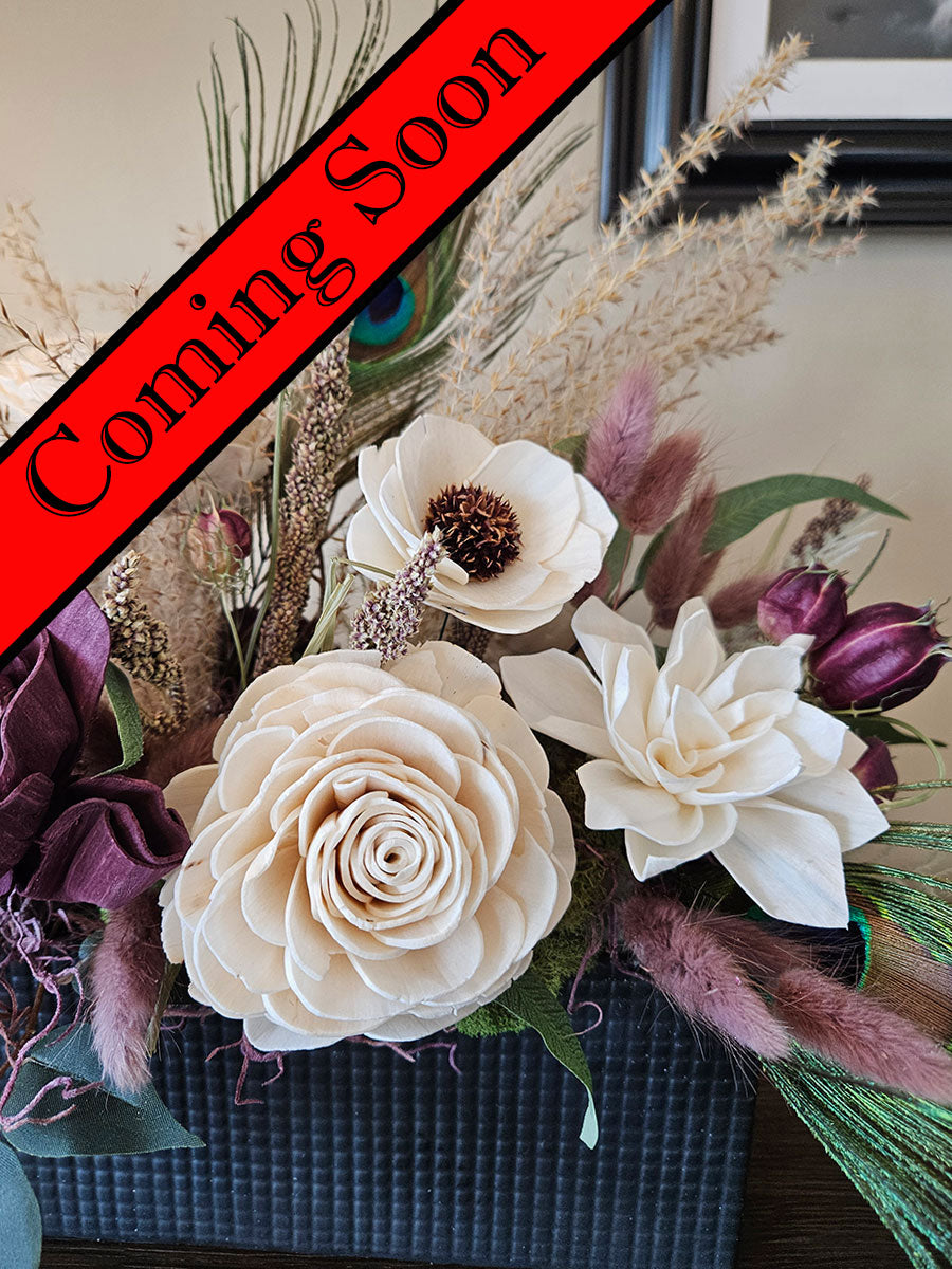 Feathers and Blooms Floral Arrangement